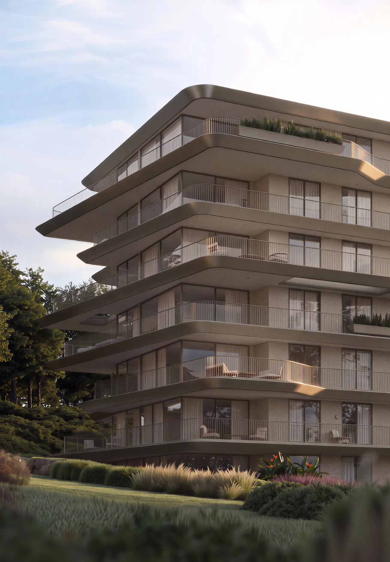 O edifício visto do jardim, com seis pisos de varandas contínuas